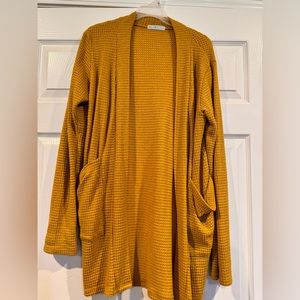 Mustard color cardigan with pockets